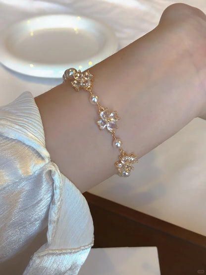 Front view of floral motif high-lustre freshwater pearl bracelet for bridal styling