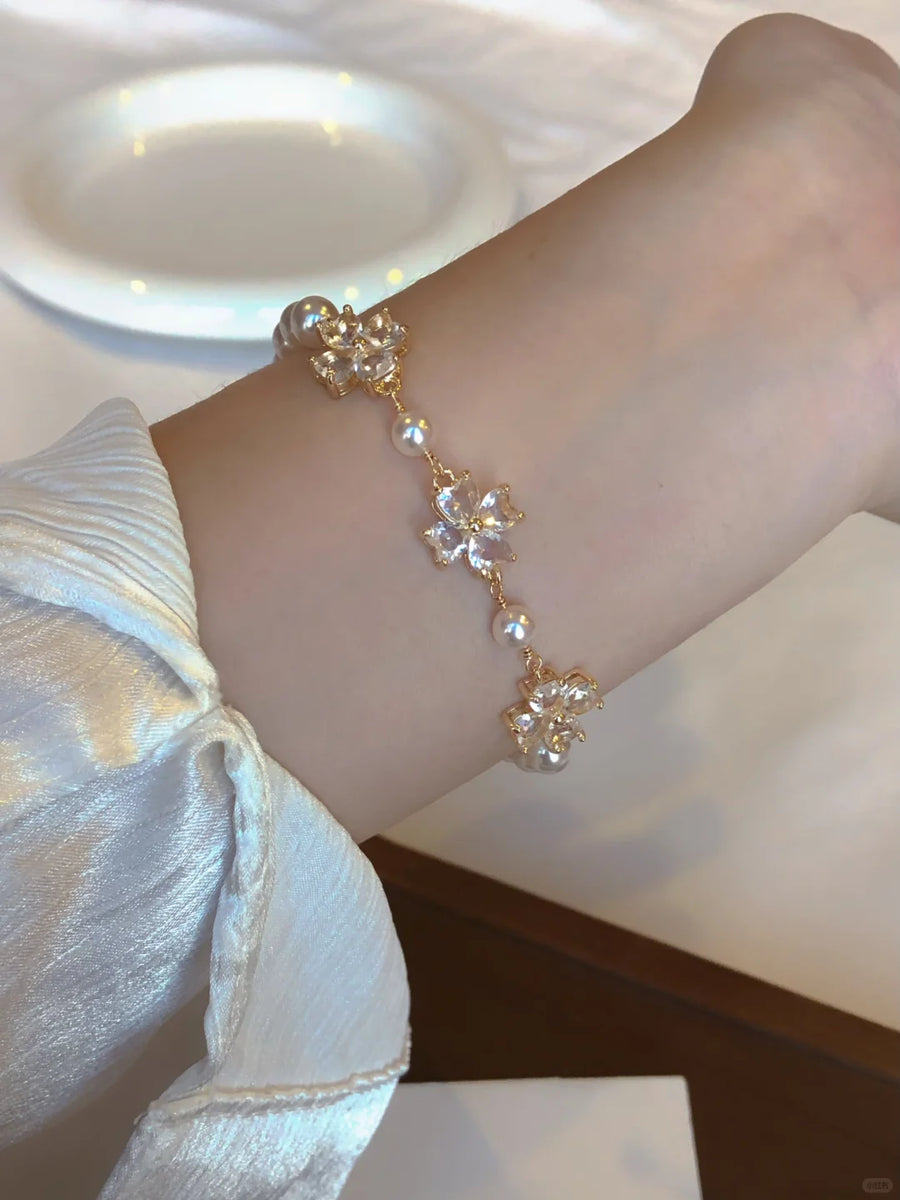Front view of floral motif high-lustre freshwater pearl bracelet for bridal styling