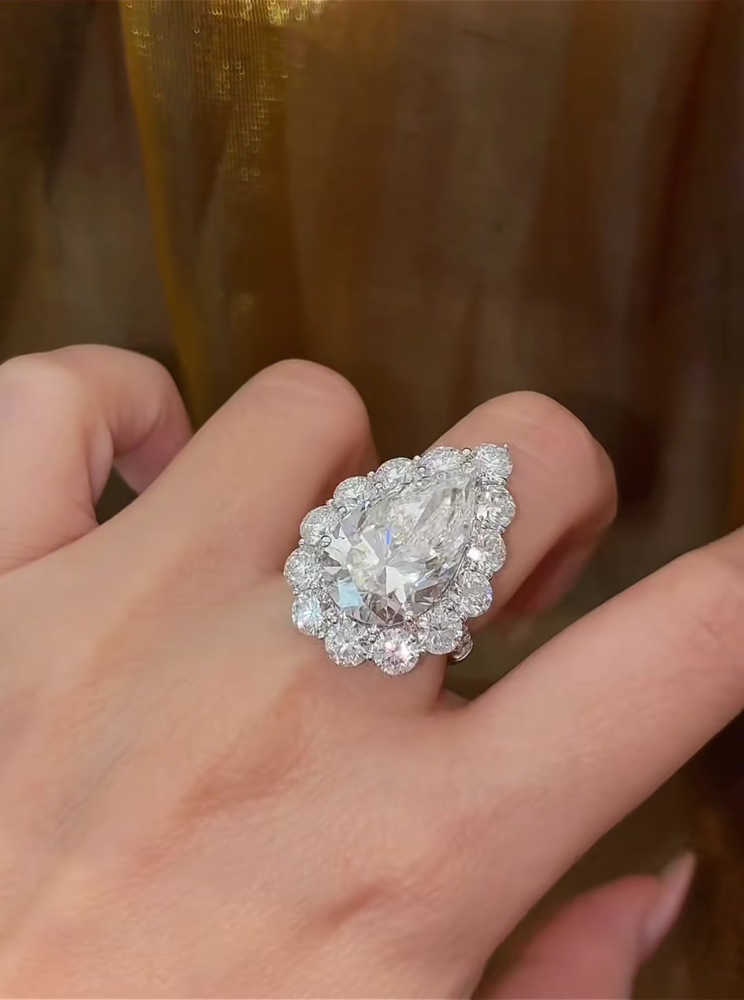 Close-up of lab-grown pink diamond floral cocktail statement ring for gala evenings