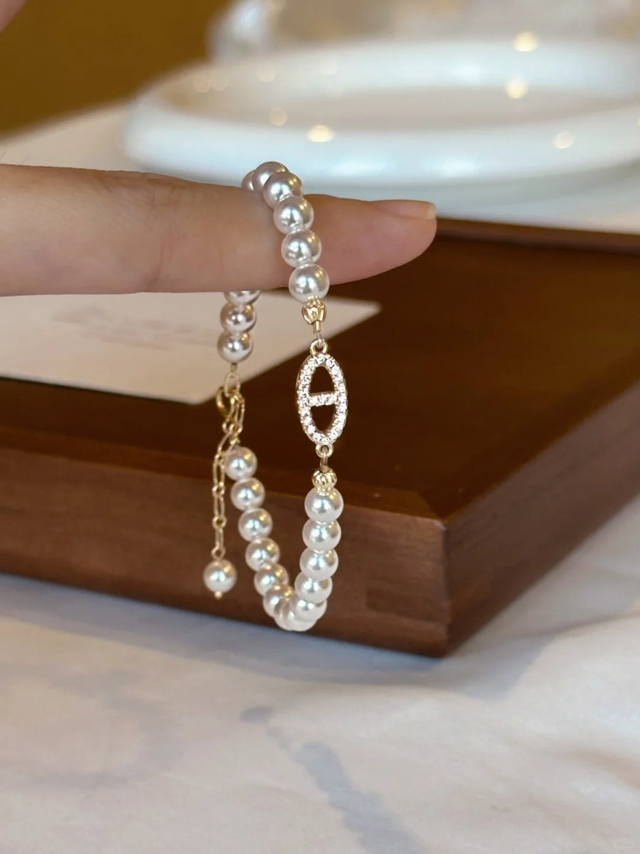 Front view of half-chain high-lustre freshwater pearl bracelet for bridal styling