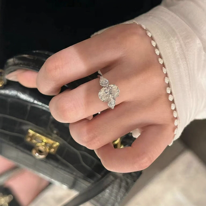 Close-up of oval lab-grown diamond three-stone engagement ring for engagement proposals