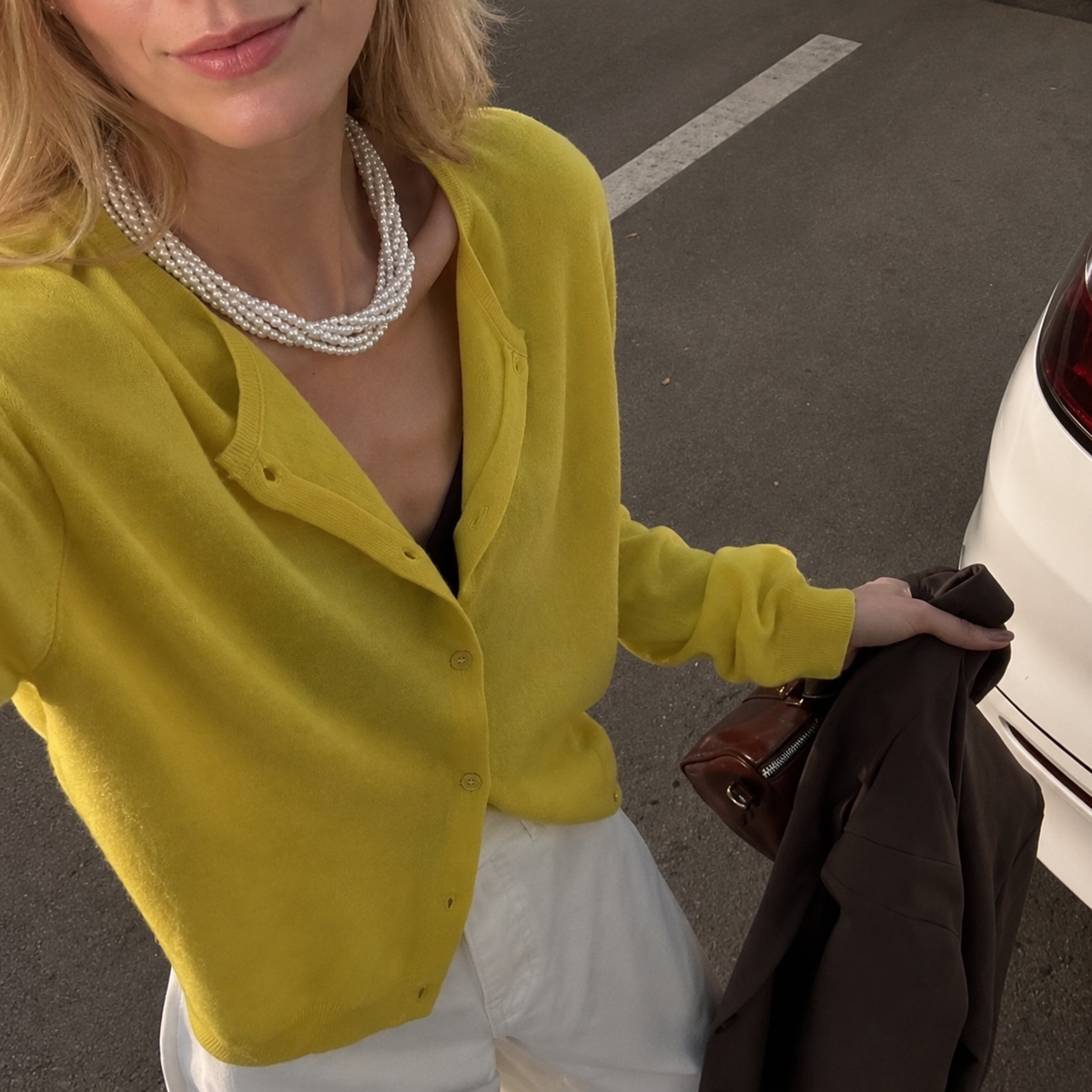 Multi-strand pearl choker styled with a contemporary outfit