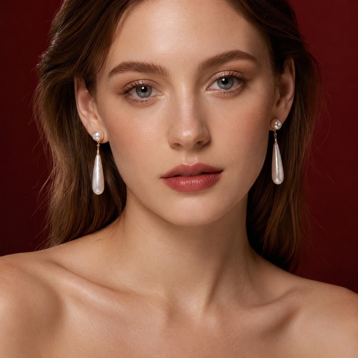 Model wearing long baroque Akoya pearl drop earrings