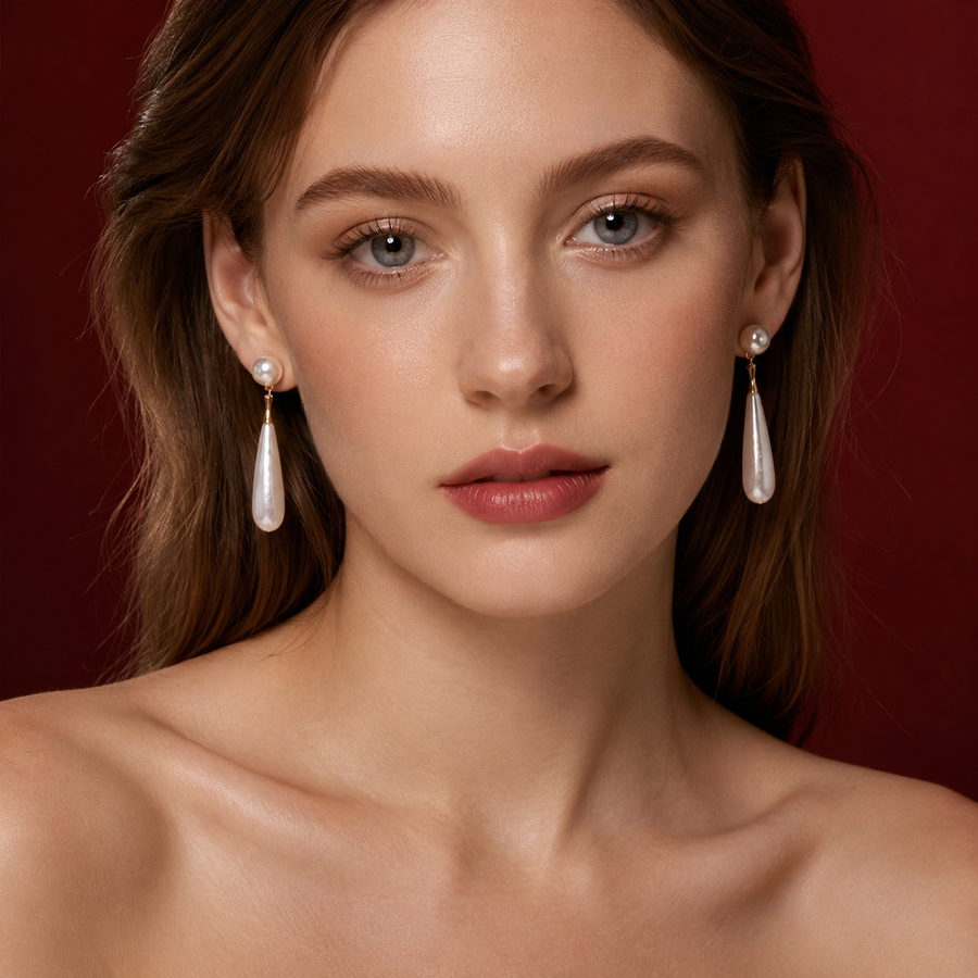 Model wearing long baroque Akoya pearl drop earrings