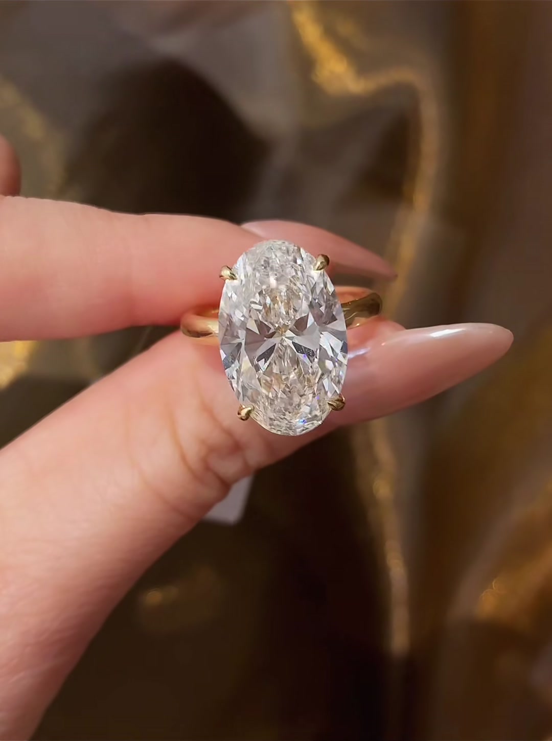 Front view of lab-grown diamond oversized oval statement ring for luxury proposals