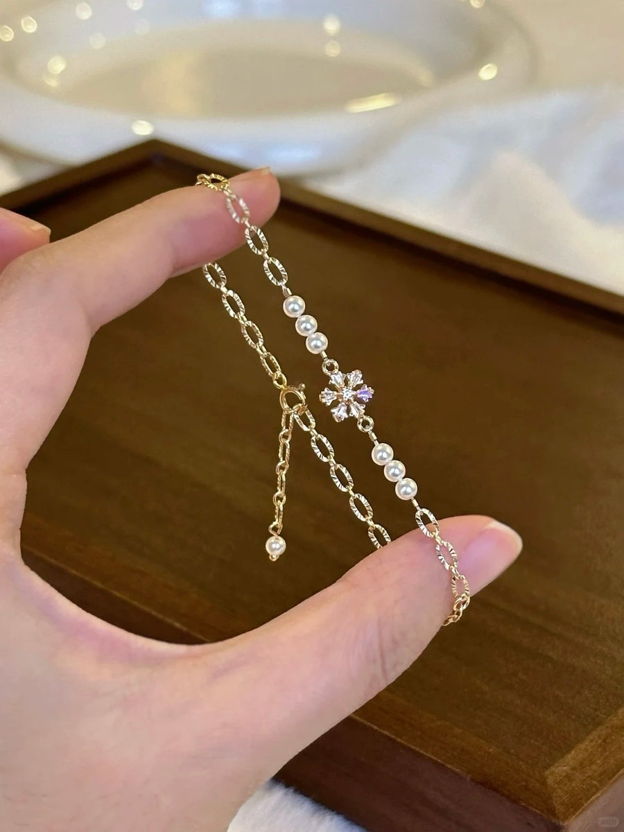 Styled view of pearl station high-lustre freshwater pearl bracelet for bridal styling