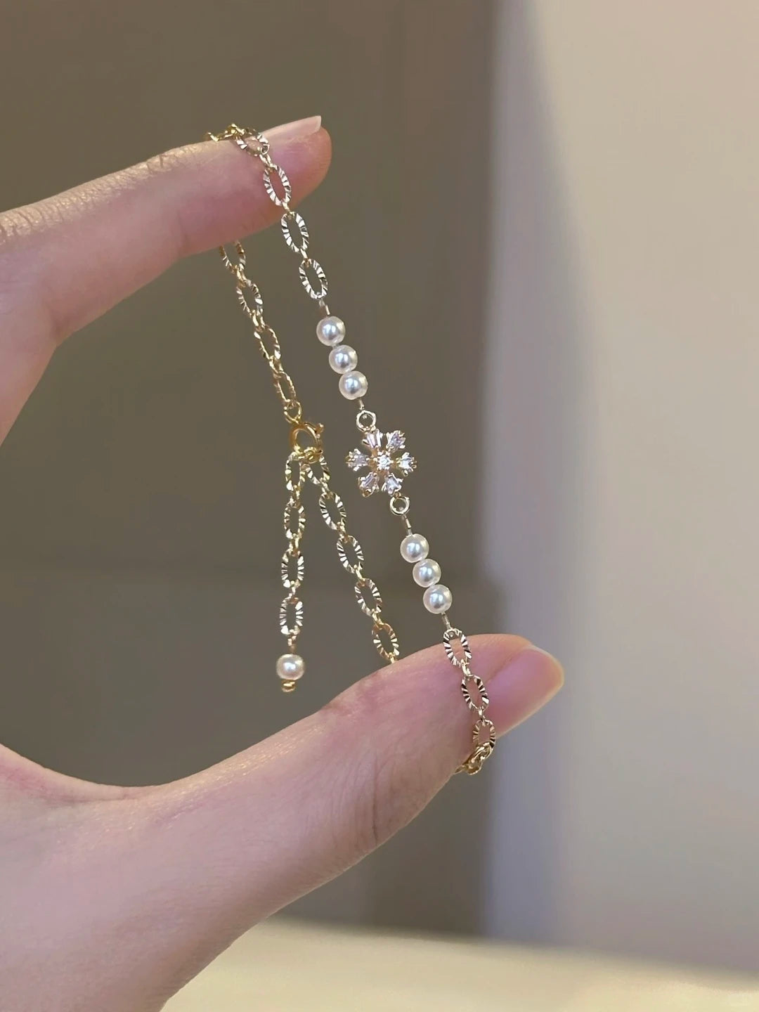 Close-up of pearl station high-lustre freshwater pearl bracelet for bridal styling