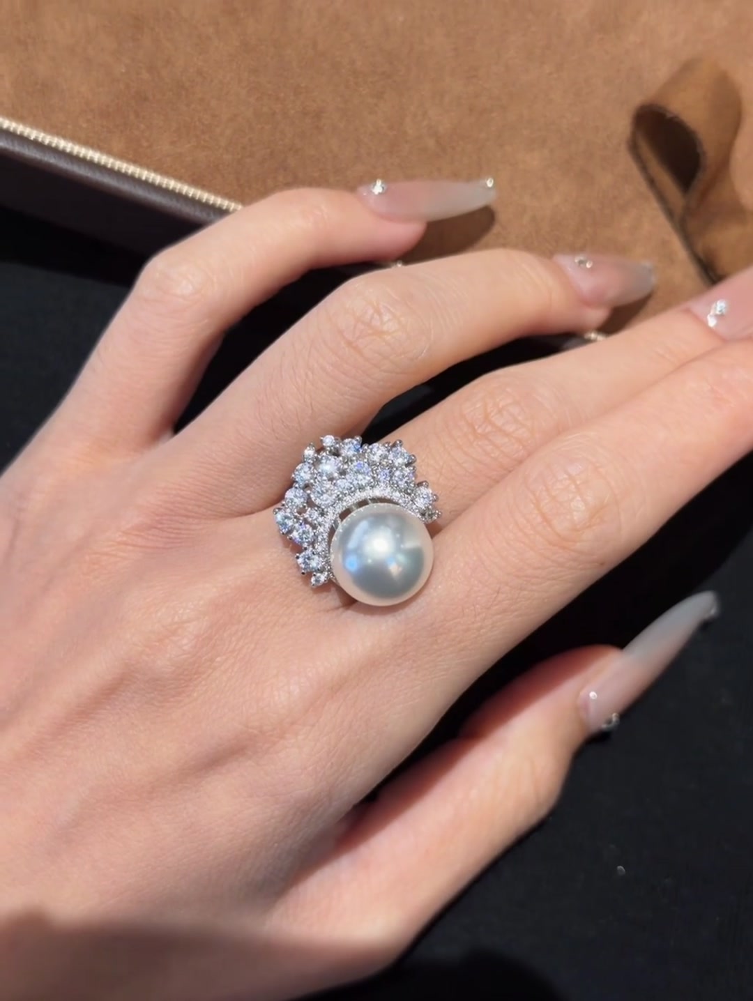 Close-up of Akoya pearl statement cocktail ring for anniversary dinners
