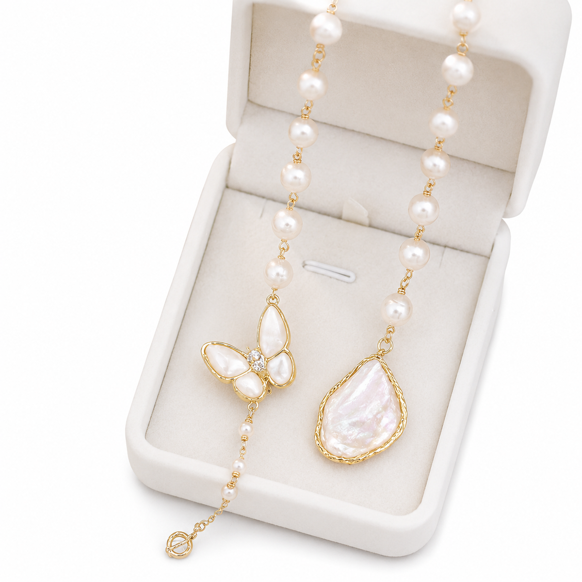 Papillon freshwater pearl and mother-of-pearl butterfly necklace in a jewellery box