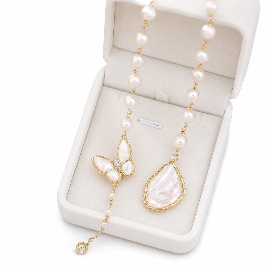 Papillon freshwater pearl and mother-of-pearl butterfly necklace in a jewellery box