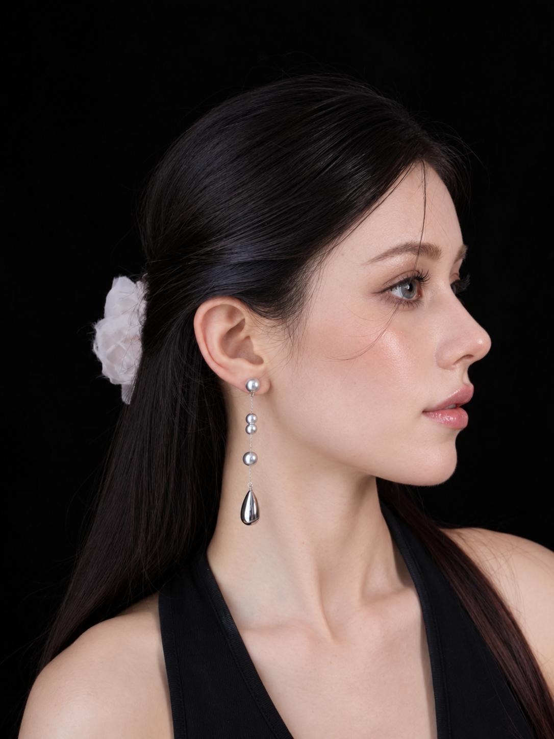 Front view of silver-tone drop high-lustre freshwater pearl earrings for wedding guest looks