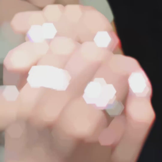 Video of lab-grown Padparadscha halo engagement ring for romantic proposals