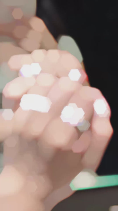 Video of lab-grown Padparadscha halo engagement ring for romantic proposals