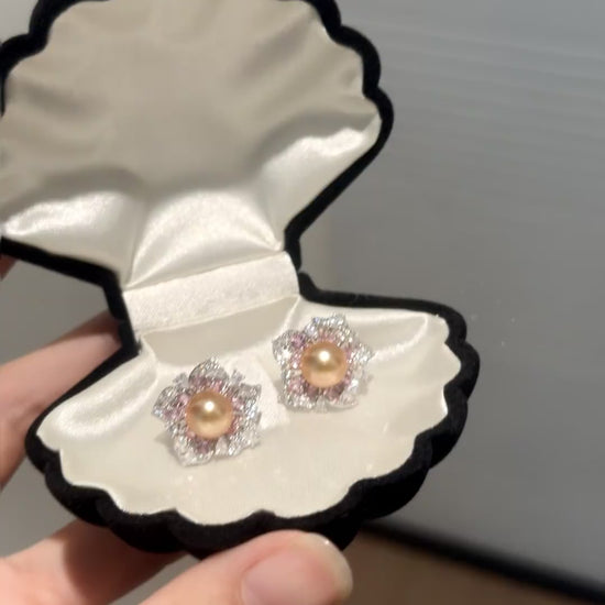 Video view of golden flower stud high-lustre freshwater pearl earrings styled for wedding guest looks