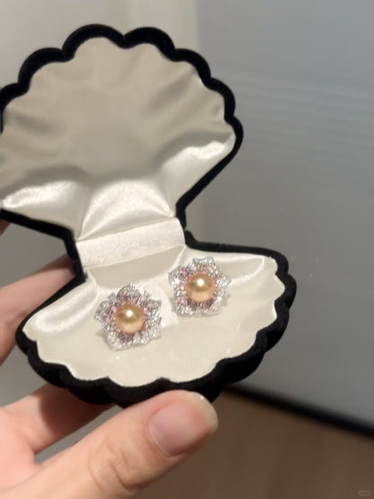 Video view of golden flower stud high-lustre freshwater pearl earrings styled for wedding guest looks