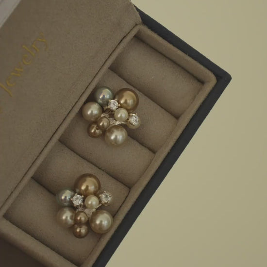 Video view of pearl cluster stud high-lustre freshwater pearl earrings styled for wedding guest looks