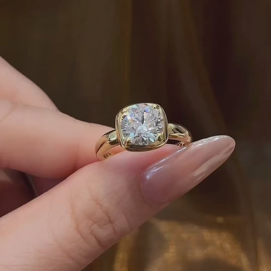 Video of lab-grown diamond cushion bezel engagement ring for modern proposals