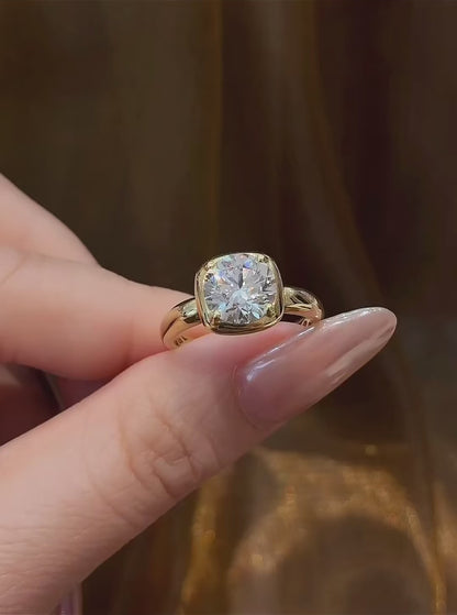 Video of lab-grown diamond cushion bezel engagement ring for modern proposals