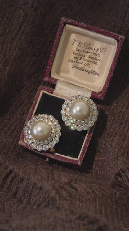 Video view of halo stud high-lustre freshwater pearl earrings styled for wedding guest looks