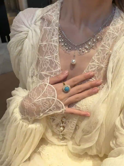 Video view of dreamcatcher high-lustre freshwater pearl necklace styled for weddings