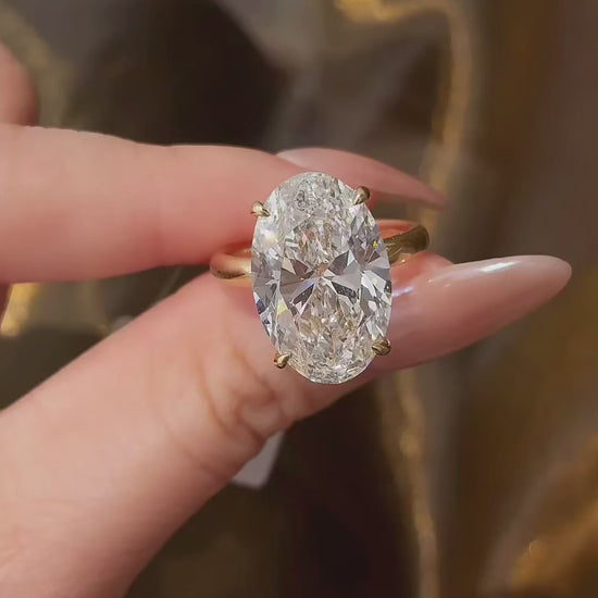 Video of lab-grown diamond oversized oval statement ring for luxury proposals