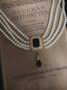 Video view of vintage cameo high-lustre freshwater pearl necklace styled for weddings