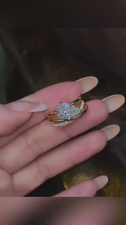 Video of lab-grown diamond pear stacking engagement ring for stylish proposals