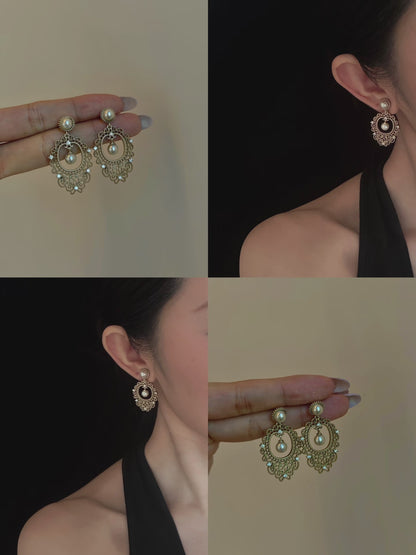 Video view of vintage lace high-lustre freshwater pearl earrings styled for wedding guest looks