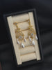 Video view of court statement high-lustre freshwater pearl earrings styled for wedding guest looks