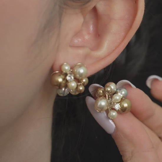 Video view of pearl cluster stud high-lustre freshwater pearl earrings styled for wedding guest looks