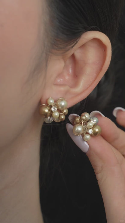 Video view of pearl cluster stud high-lustre freshwater pearl earrings styled for wedding guest looks
