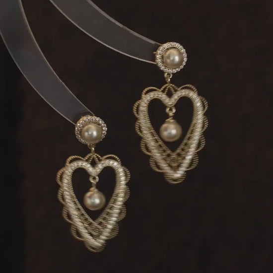 Video view of lace heart high-lustre freshwater pearl earrings styled for wedding guest looks