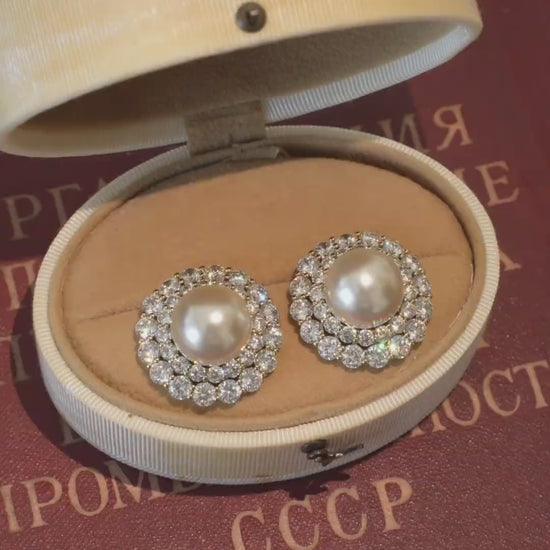 Video view of halo stud high-lustre freshwater pearl earrings styled for wedding guest looks