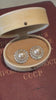 Video view of halo stud high-lustre freshwater pearl earrings styled for wedding guest looks