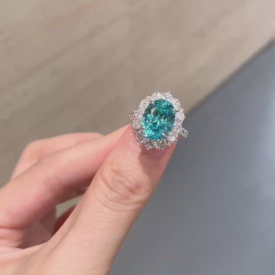 Video of lab-grown Paraiba blue halo statement ring for cocktail parties