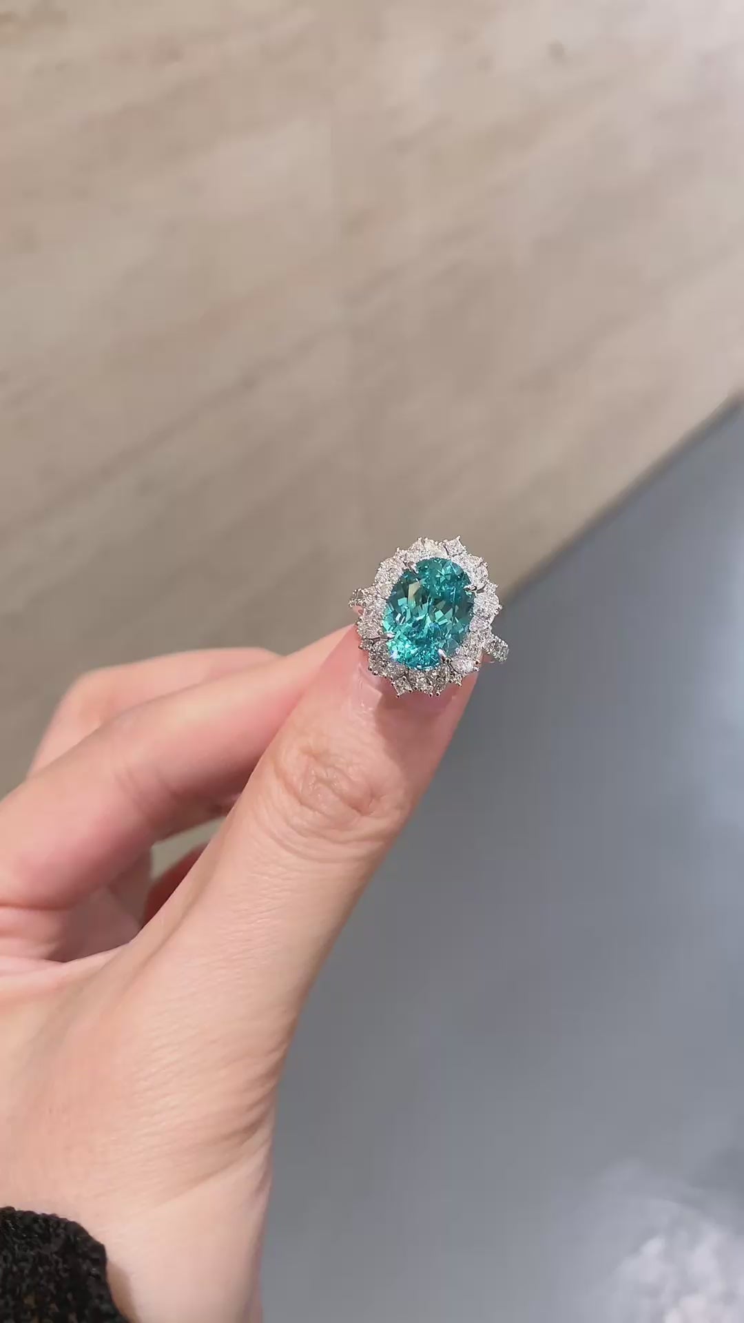 Video of lab-grown Paraiba blue halo statement ring for cocktail parties