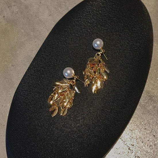 Video view of vintage statement high-lustre freshwater pearl earrings styled for wedding guest looks