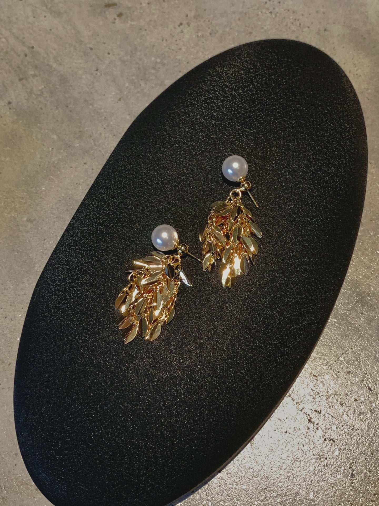 Video view of vintage statement high-lustre freshwater pearl earrings styled for wedding guest looks