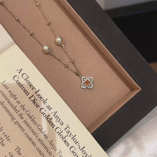 Video view of four-leaf clover high-lustre freshwater pearl necklace styled for weddings