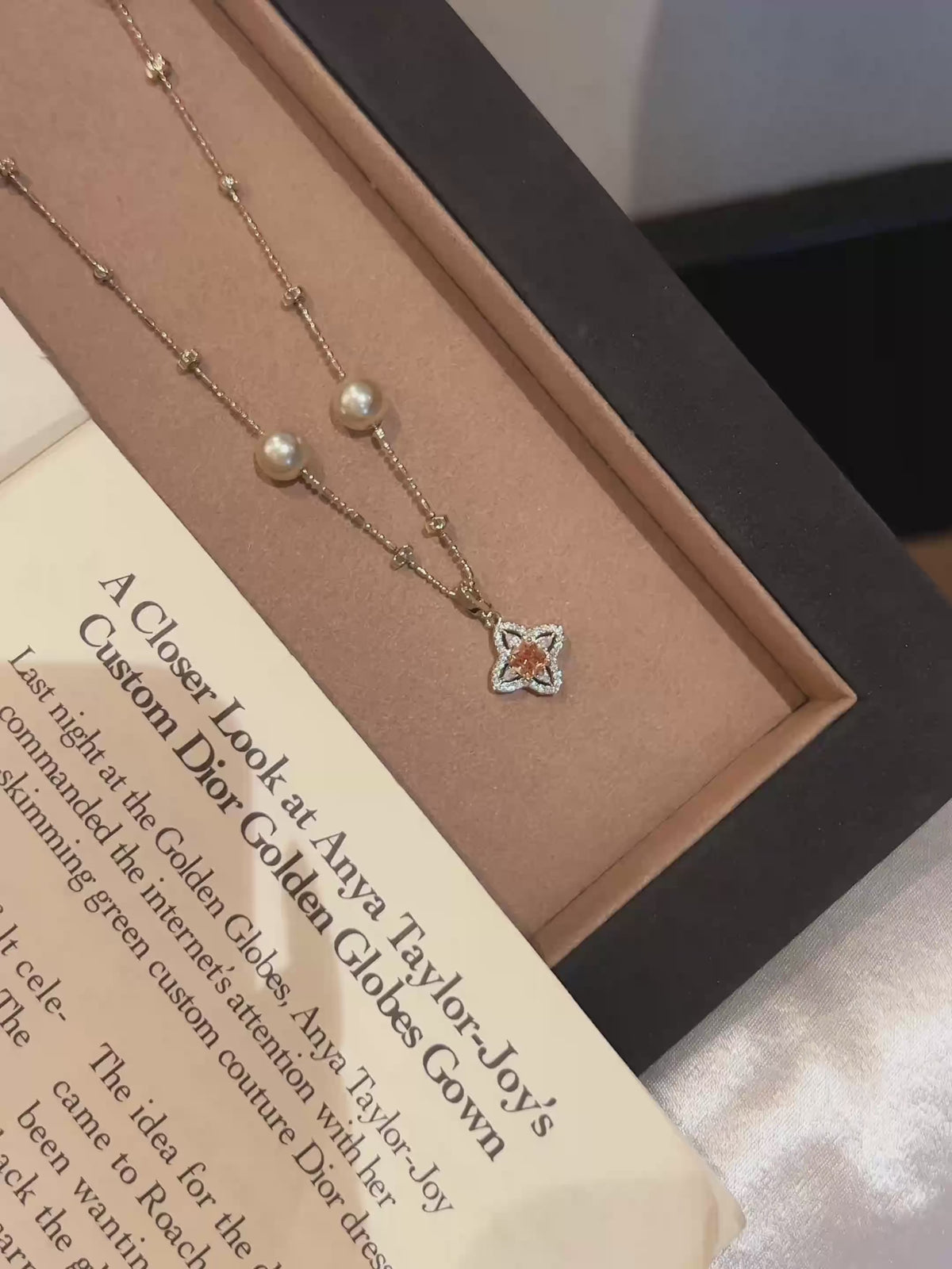 Video view of four-leaf clover high-lustre freshwater pearl necklace styled for weddings