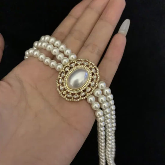 Video view of multi-strand high-lustre freshwater pearl bracelet styled for bridal styling