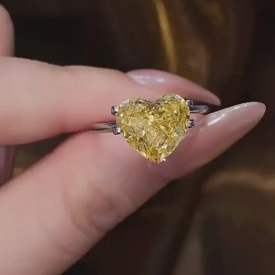 Video of lab-grown yellow diamond heart engagement ring for bold proposals