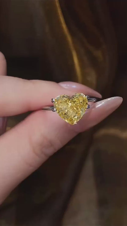Video of lab-grown yellow diamond heart engagement ring for bold proposals