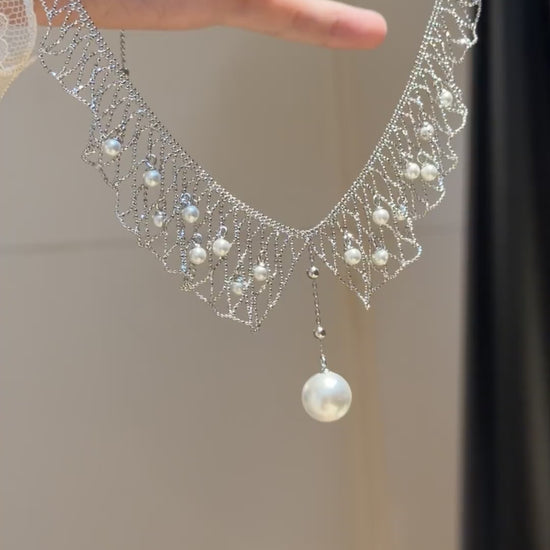 Video view of dreamcatcher high-lustre freshwater pearl necklace styled for weddings