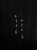 Video view of silver-tone drop high-lustre freshwater pearl earrings styled for wedding guest looks