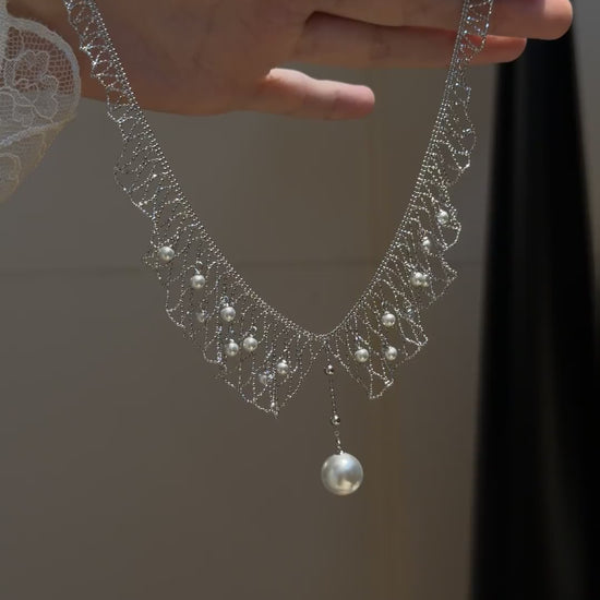 Video view of dreamcatcher high-lustre freshwater pearl necklace styled for weddings
