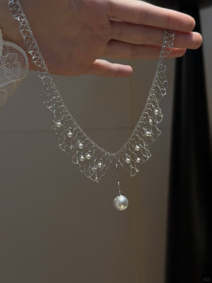 Video view of dreamcatcher high-lustre freshwater pearl necklace styled for weddings