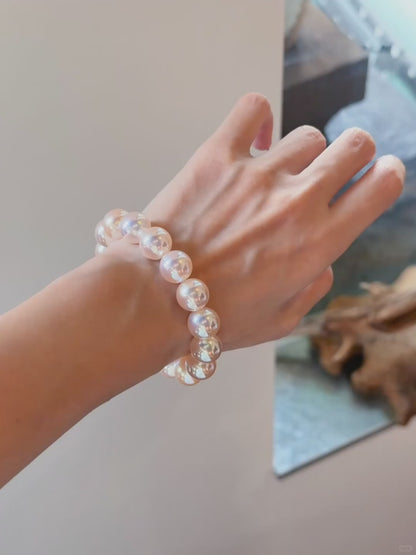 Video view of blush strand high-lustre freshwater pearl bracelet styled for bridal styling