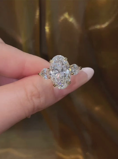 Video of lab-grown diamond oval three stone engagement ring for engagement proposals