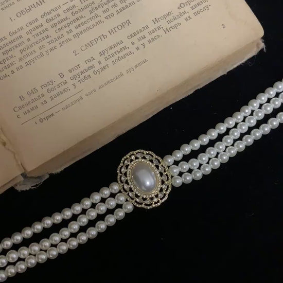 Video view of multi-strand high-lustre freshwater pearl bracelet styled for bridal styling